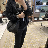 Saddle Curve Leather Crossbody Bag